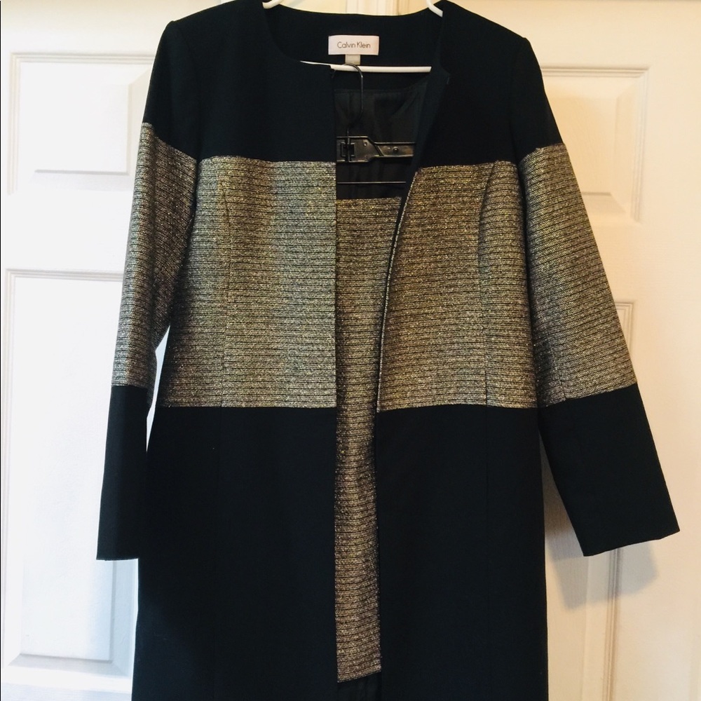 Calvin Klein’s jacket black and gold no damage